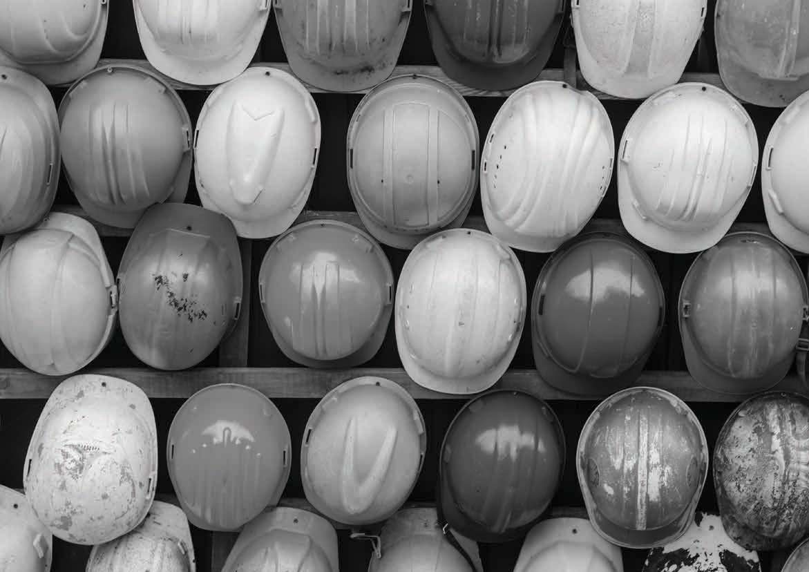 Rows of well-worn safety helmets